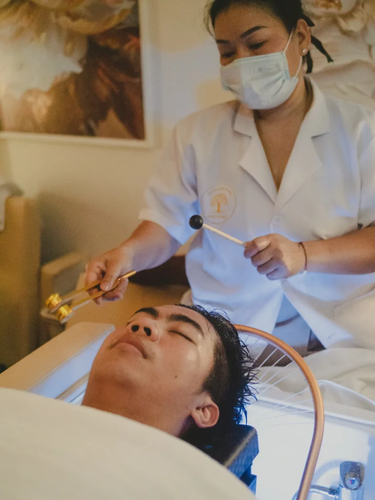 Cold stone and gua sha facial massage in a head spa package